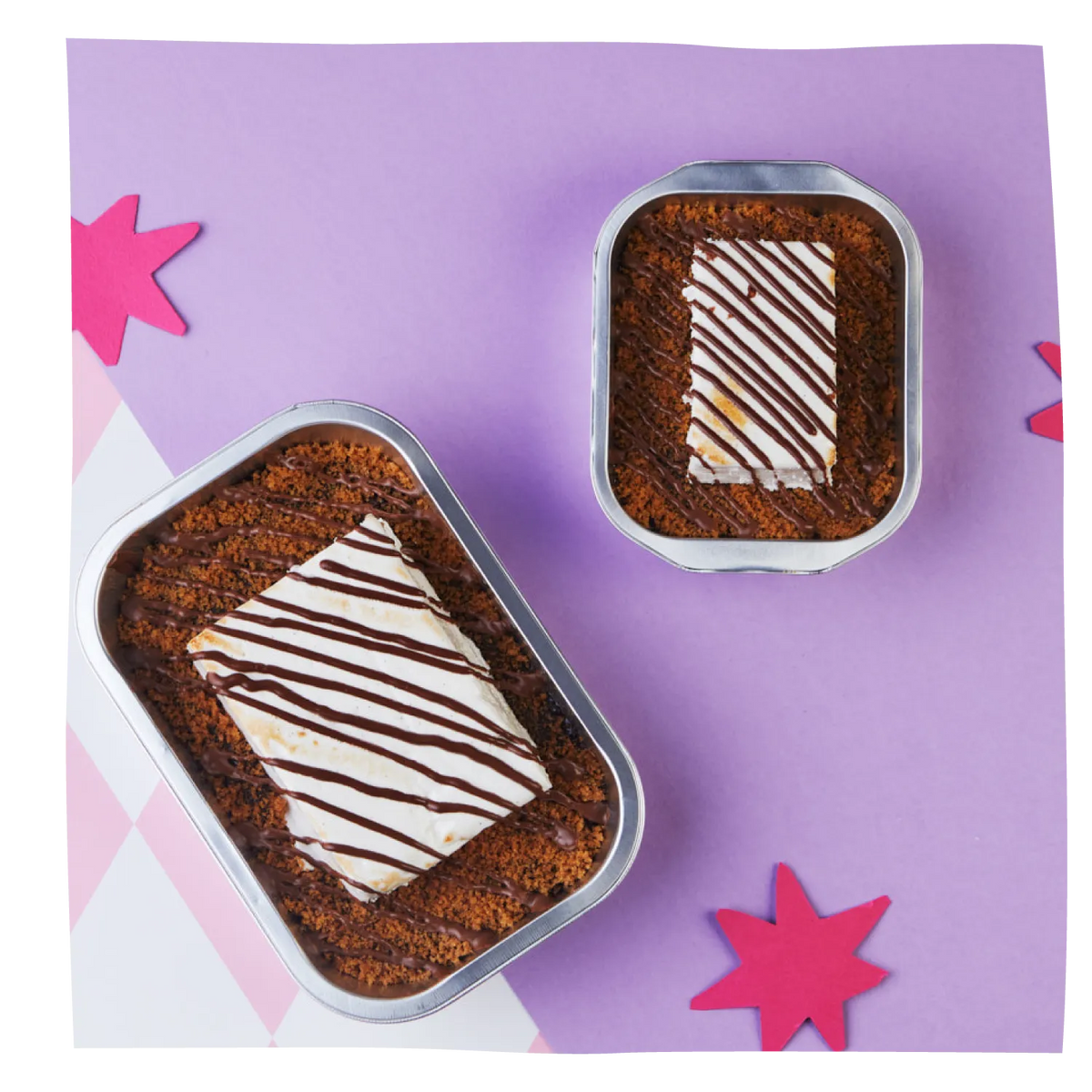 Two rectangular metal tins containing Hot Fudge Brownie Pudding- S’more