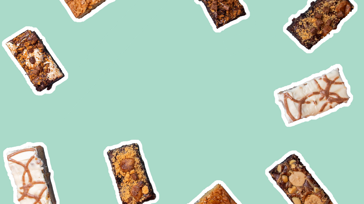 A collage of assorted chocolate brownies around the edges of a solid mint green background, with the centre left empty.
